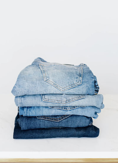 Folded jeans on a table