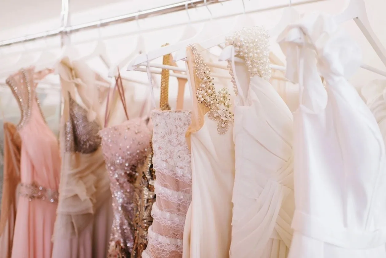 Luxury sparkling women's dresses on hangers